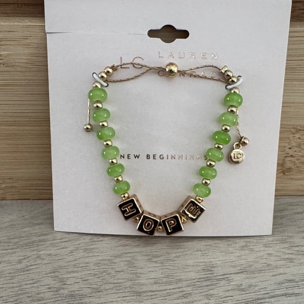 LC Lauren Conrad NWT Green and Gold Hope Adjustable Bracelet.